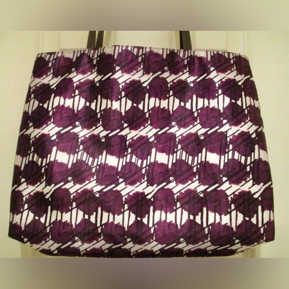 NWOT HENRI BENDEL IZAK TOTE
Purple 18” with brown logo satin interior - Picture 5 of 9